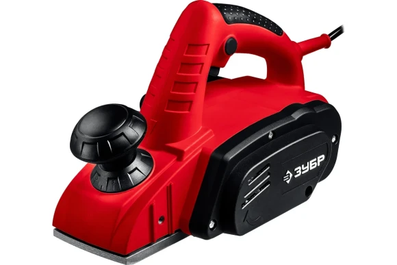 Рубанок электрический ЗУБР ЗР-750-82, 750Вт, 82мм, 0-2мм, 16000об/мин Рубанок электрический ЗУБР ЗР-750-82, 750Вт, 82мм, 0-2мм, 16000об/мин